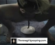A woman squats over a plate and poops.